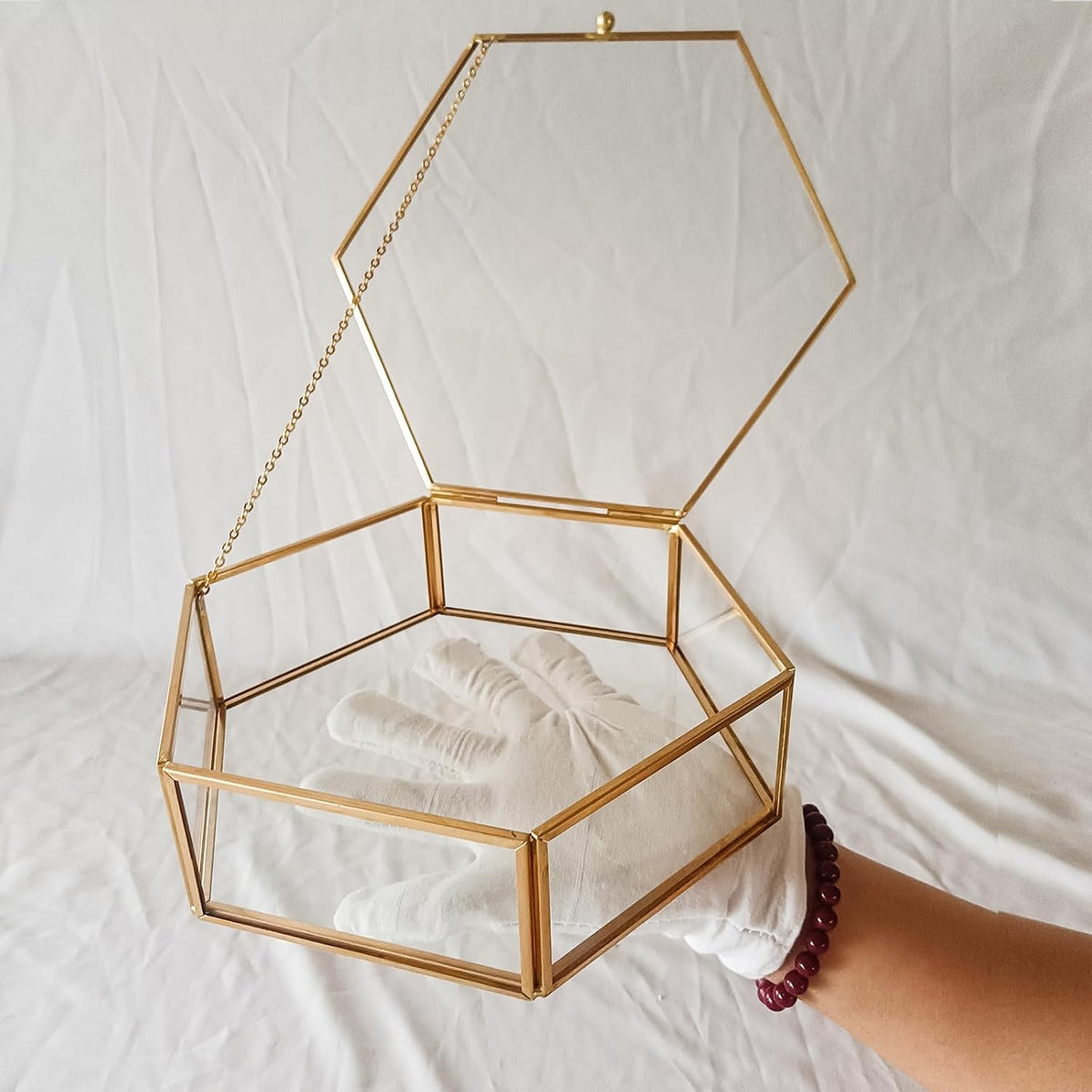 Open hexagonal glass jewelry box